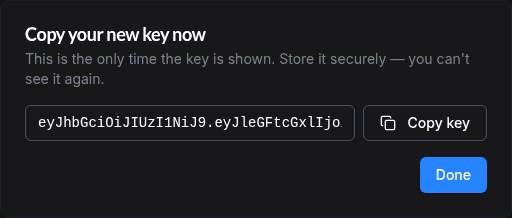 Key reveal dialog after creation showing the one-time read-only key textbox and Copy key button