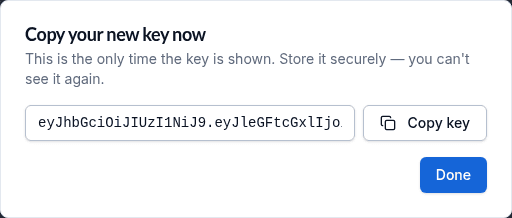 Key reveal dialog after creation showing the one-time read-only key textbox and Copy key button